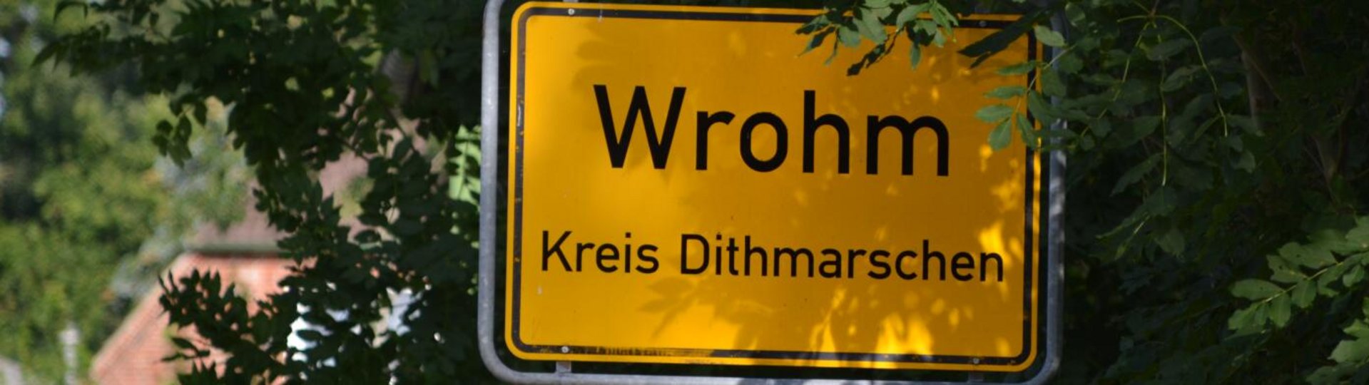 Ortseingangsschild Wrohm